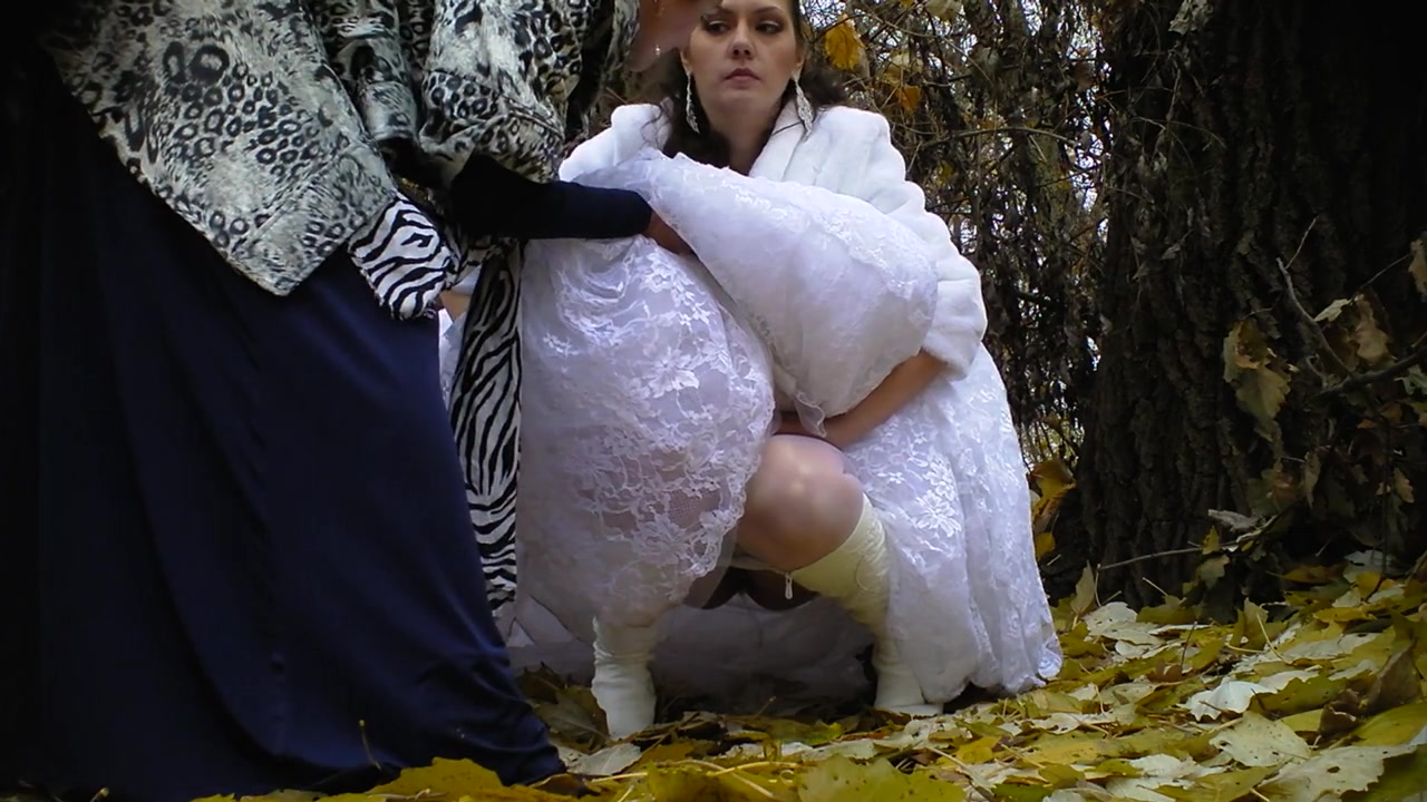 Wedding Room Voyeur - Bride struggles with her wedding dress as she pees in the woods |  voyeurstyle.com