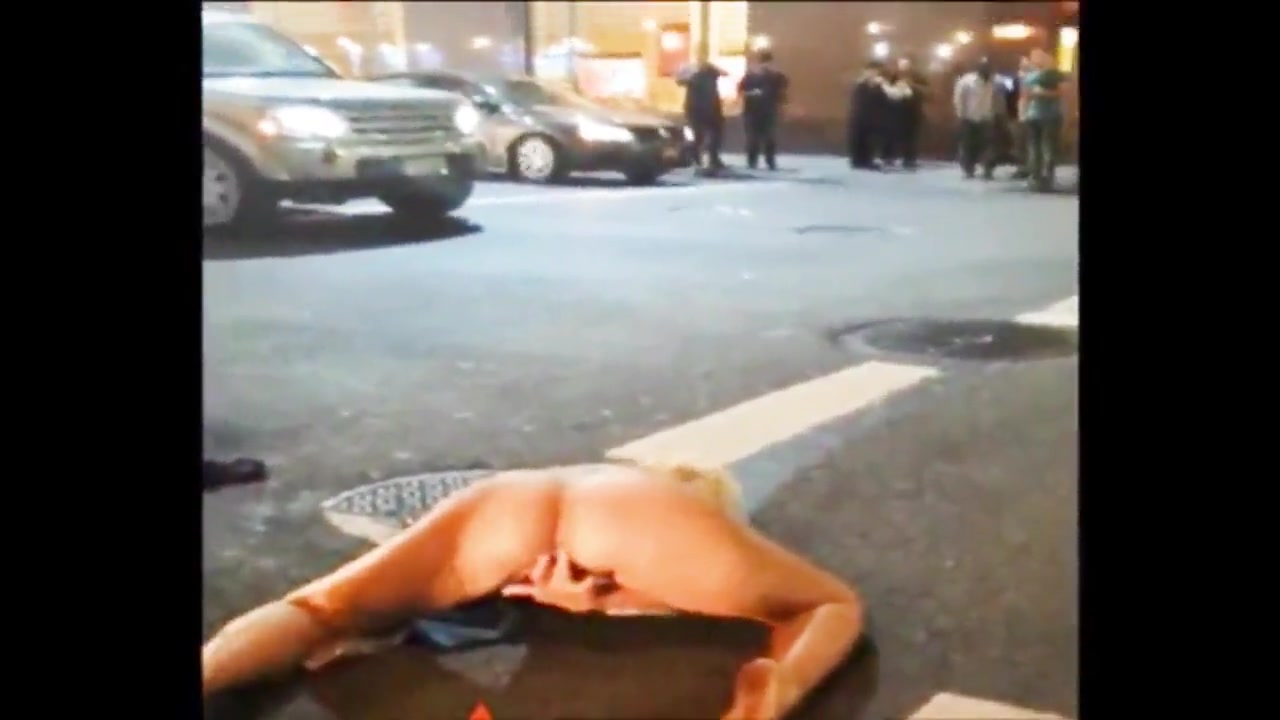 Naked drunk woman in the street voyeurstyle photo image
