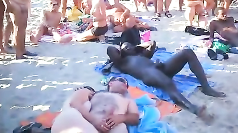 Nudist orgy at the beach with an audience voyeurstyle image