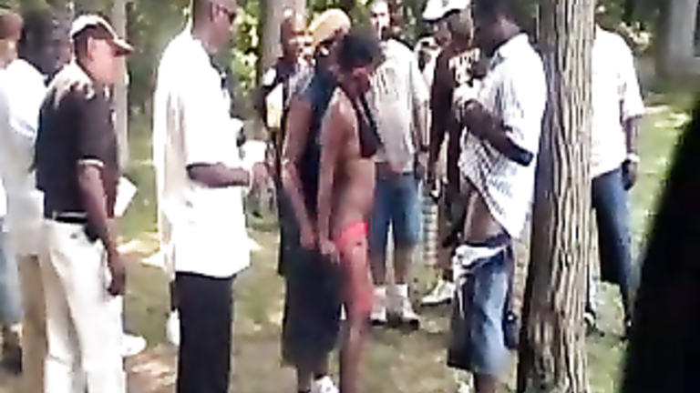 Black hookers make money on a day at the public park voyeurstyle photo