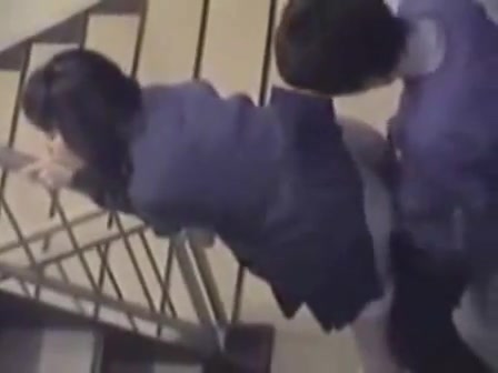 Amateur Asian girl banged in a stairwell voyeurstyle image