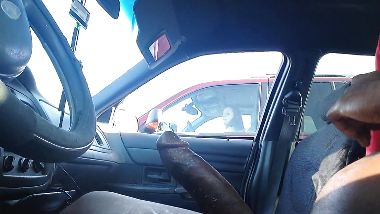 Flashing big black cock to a lady in a car voyeurstyle picture photo